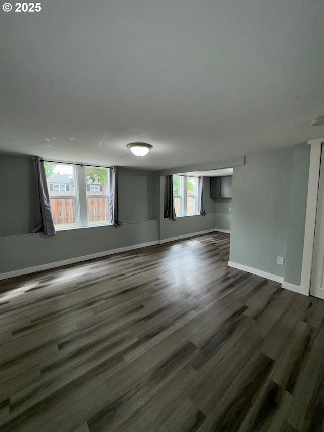 1605 4th St, Salem, OR 97301 - spare room with dark wood finished floors and baseboards