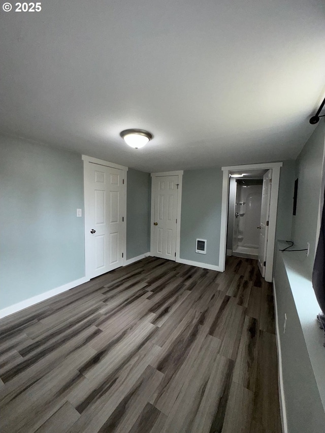 1605 4th St, Salem, OR 97301 - unfurnished bedroom featuring wood finished floors and baseboards