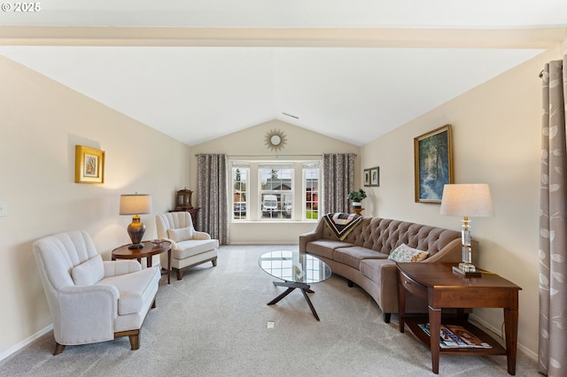 carpeted living room with baseboards and vaulted ceiling