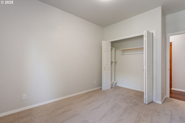1225 NE 3rd Ave, Hillsboro, OR 97124 - unfurnished bedroom featuring carpet floors and a closet
