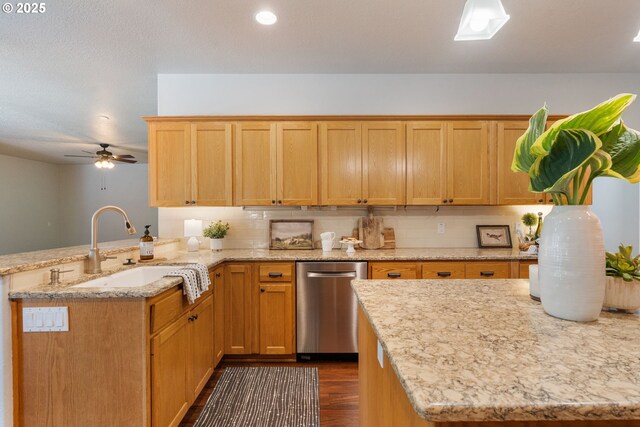 1225 NE 3rd Ave, Hillsboro, OR 97124 - kitchen with stainless steel dishwasher, a peninsula, ceiling fan, decorative backsplash, and dark wood finished floors