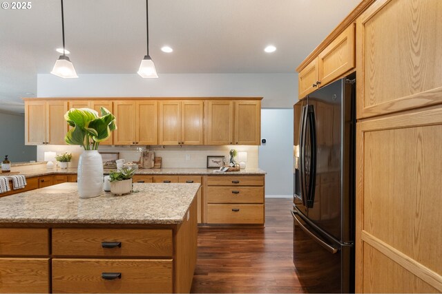 1225 NE 3rd Ave, Hillsboro, OR 97124 - kitchen featuring black fridge with ice dispenser, dark wood-style floors, light brown cabinets, light stone counters, and pendant lighting
