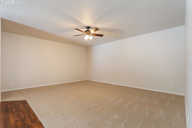 1225 NE 3rd Ave, Hillsboro, OR 97124 - spare room with a ceiling fan, light carpet, and a textured ceiling