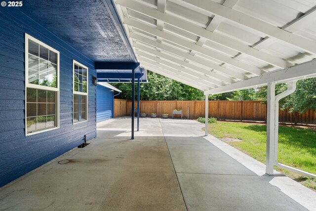 1225 NE 3rd Ave, Hillsboro, OR 97124 - fenced backyard with a patio