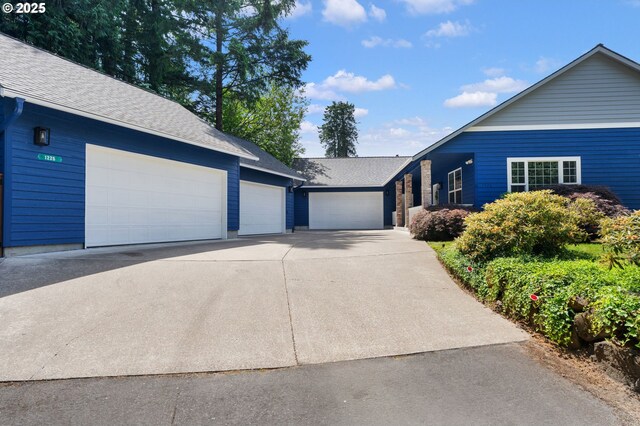 1225 NE 3rd Ave, Hillsboro, OR 97124 - single story home featuring roof with shingles and a garage