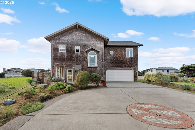 front of property with a garage