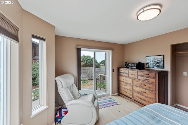 bedroom with light wood-type flooring