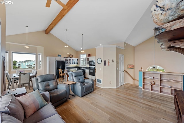 living room featuring ceiling fan, beam ceiling, high vaulted ceiling, and light hardwood / wood-style flooring