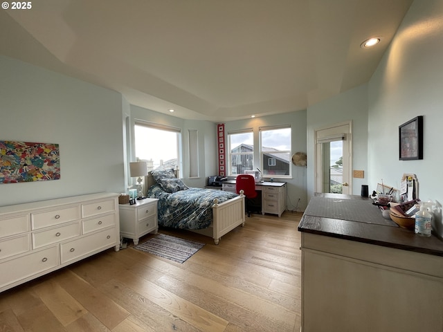 bedroom with light hardwood / wood-style floors