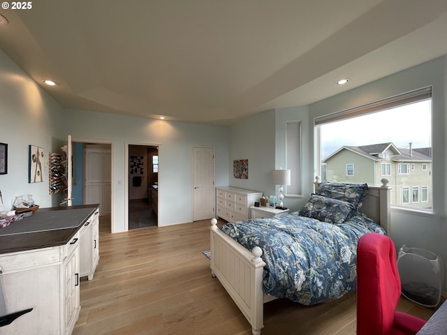 bedroom featuring light wood-type flooring