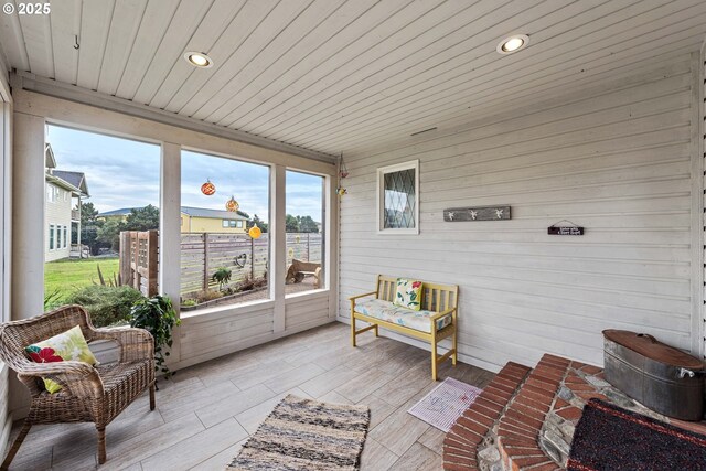 sunroom with wooden ceiling