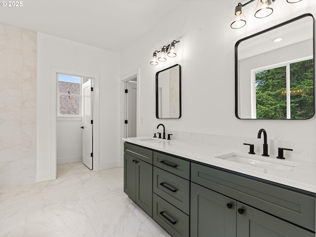 6715 NE 132nd St, Vancouver, WA 98686 - full bath with double vanity, marble look tile flooring, and baseboards
