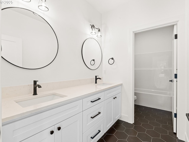 6715 NE 132nd St, Vancouver, WA 98686 - bathroom featuring double vanity, toilet, tile patterned flooring, and a tub to relax in