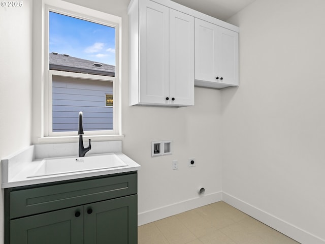 6715 NE 132nd St, Vancouver, WA 98686 - laundry area featuring washer hookup, electric dryer hookup, cabinet space, baseboards, and light floors