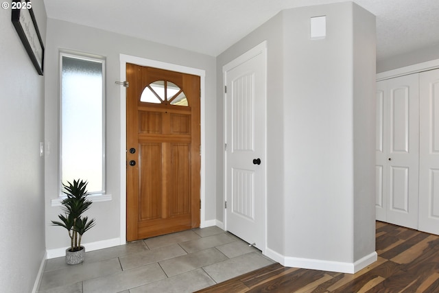18294 SW Bergs Ct, Beaverton, OR 97003 - entrance foyer with baseboards and light tile patterned floors