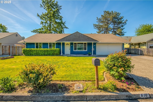 ranch-style house featuring an attached garage and concrete driveway