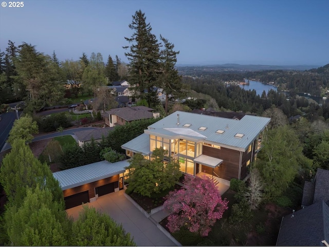 bird's eye view featuring a view of trees