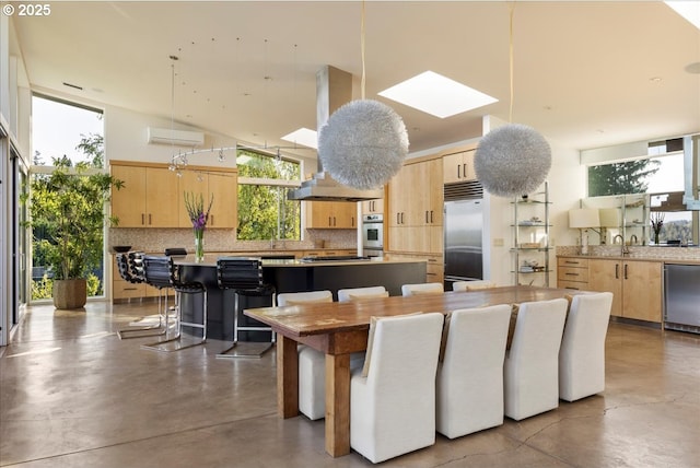 1900 Crest Dr, Lake Oswego, OR 97034 - dining room with finished concrete floors and a wall unit AC
