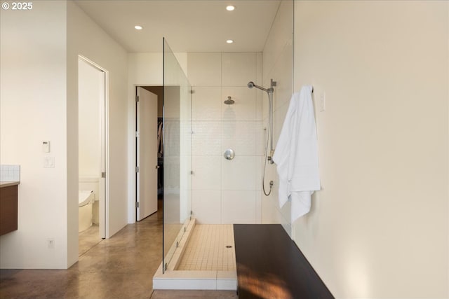 full bath featuring recessed lighting, finished concrete floors, and a stall shower