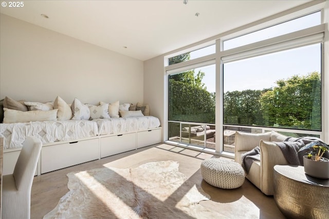 living area with a wall of windows