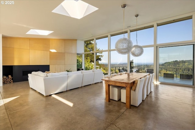 sunroom / solarium featuring a skylight
