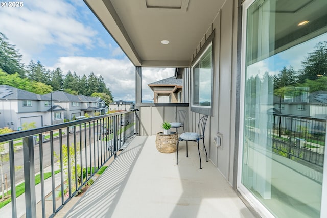 balcony featuring a residential view
