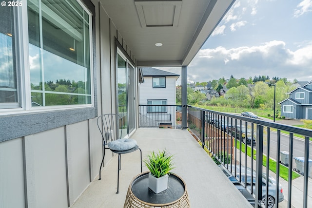 balcony featuring a residential view