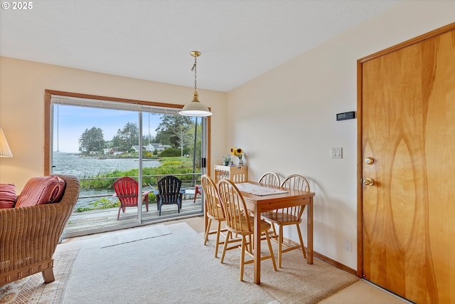 3621 NE 10th St, Otis, OR 97368 - carpeted dining room featuring baseboards