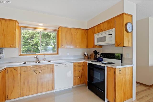 3621 NE 10th St, Otis, OR 97368 - kitchen featuring white appliances, a sink, and light countertops
