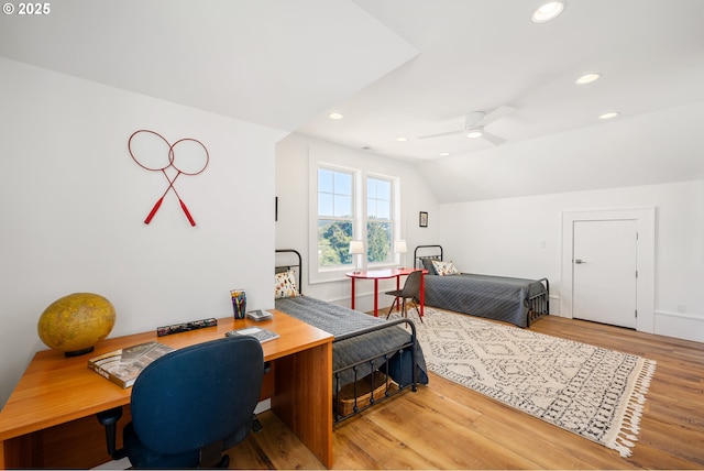 bedroom with vaulted ceiling, a ceiling fan, wood finished floors, and recessed lighting