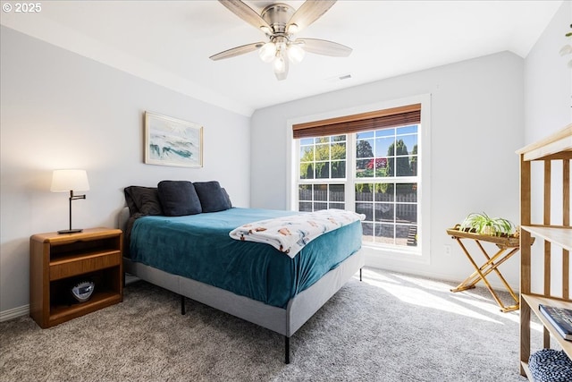 bedroom with visible vents, a ceiling fan, carpet, and baseboards