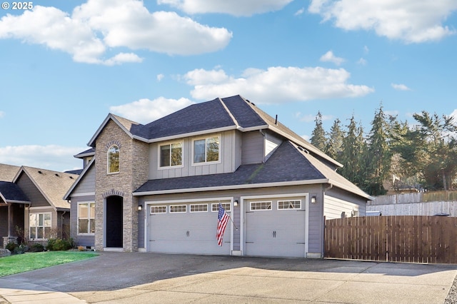 craftsman-style home with a garage