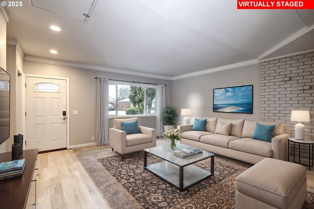 empty room featuring a textured ceiling, hardwood / wood-style flooring, visible vents, and baseboards