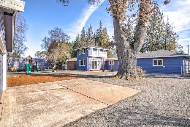 view of front of home with a playground