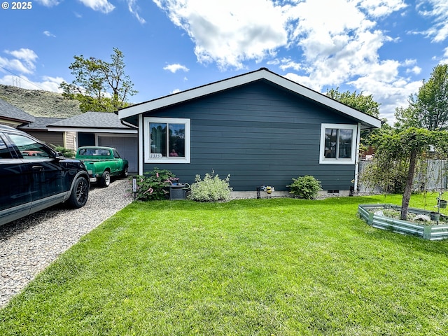 1315 Auburn Ave, Baker City, OR 97814 - view of property exterior with a yard and a vegetable garden