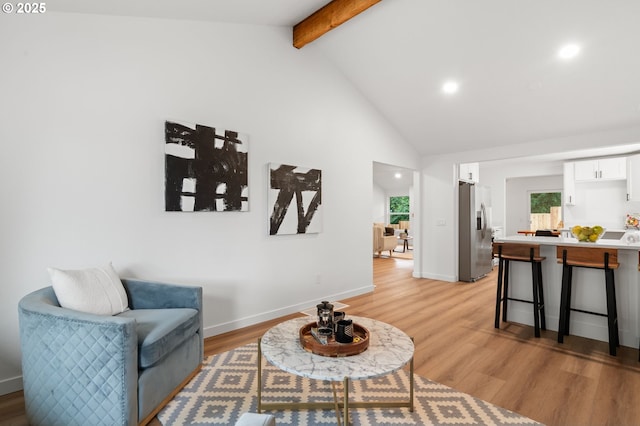 6300 SW Arranmore Pl, Portland, OR 97223 - living room with beamed ceiling, high vaulted ceiling, light wood-type flooring, and recessed lighting