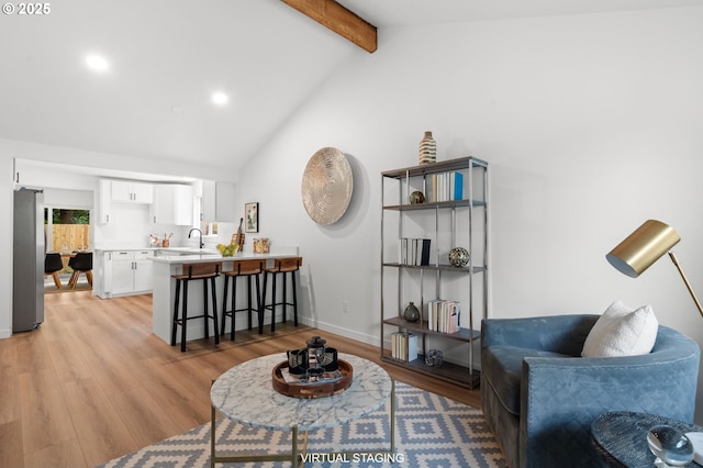 6300 SW Arranmore Pl, Portland, OR 97223 - living area featuring beam ceiling, light wood-style floors, recessed lighting, and high vaulted ceiling