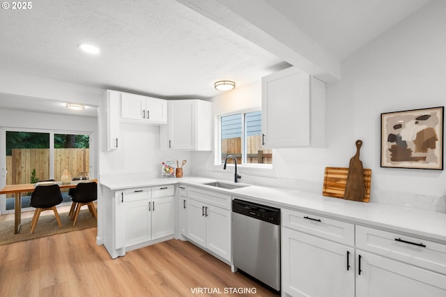 6300 SW Arranmore Pl, Portland, OR 97223 - kitchen with dishwasher, white cabinetry, light wood finished floors, light countertops, and recessed lighting