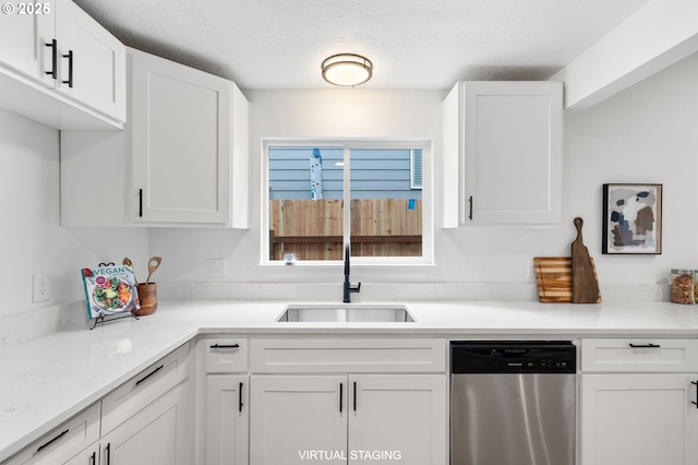 6300 SW Arranmore Pl, Portland, OR 97223 - kitchen featuring dishwasher, white cabinets, and a textured ceiling