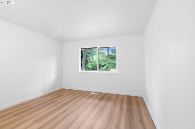 6300 SW Arranmore Pl, Portland, OR 97223 - empty room with light wood finished floors and baseboards