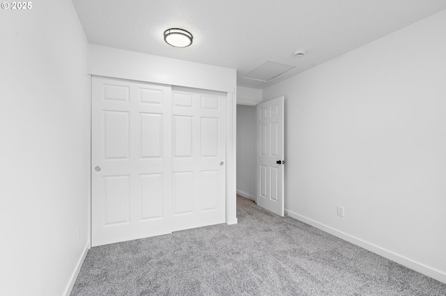 6300 SW Arranmore Pl, Portland, OR 97223 - unfurnished bedroom with carpet floors, attic access, and a closet