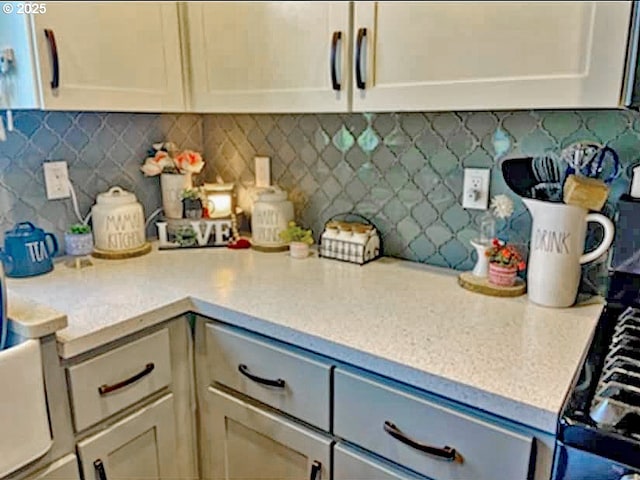 kitchen with tasteful backsplash