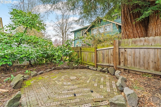 exterior space with a patio area and fence