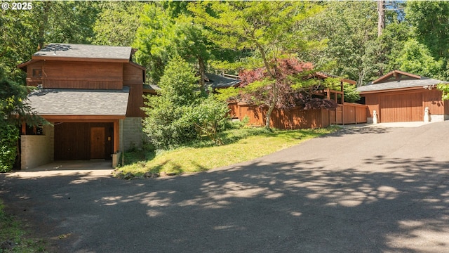 5070 Fox Hollow Rd, Eugene, OR 97405 - view of front of house with asphalt driveway