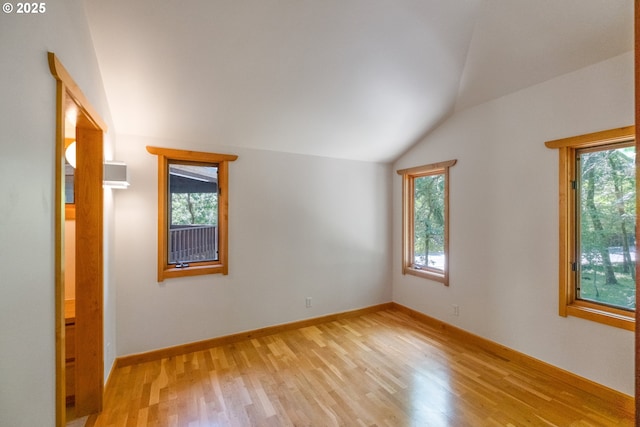 5070 Fox Hollow Rd, Eugene, OR 97405 - spare room featuring vaulted ceiling and light wood-style floors