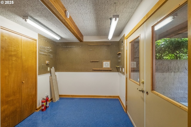 5070 Fox Hollow Rd, Eugene, OR 97405 - corridor with carpet floors and a textured ceiling