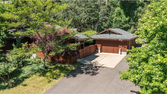 5070 Fox Hollow Rd, Eugene, OR 97405 - garage featuring asphalt driveway