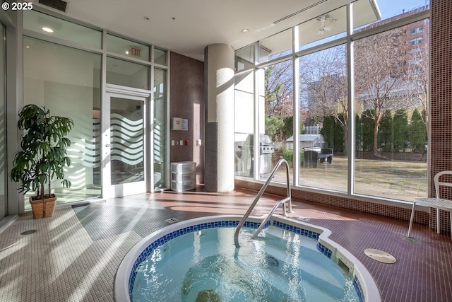 view of pool featuring an indoor in ground hot tub