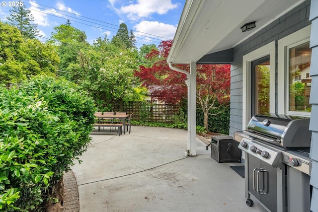 3537 SW Woods St, Portland, OR 97221 - view of patio with outdoor dining space, fence, and grilling area