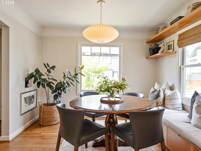 3556 NE Alberta Ct, Portland, OR 97211 - dining room featuring light wood-style flooring and baseboards